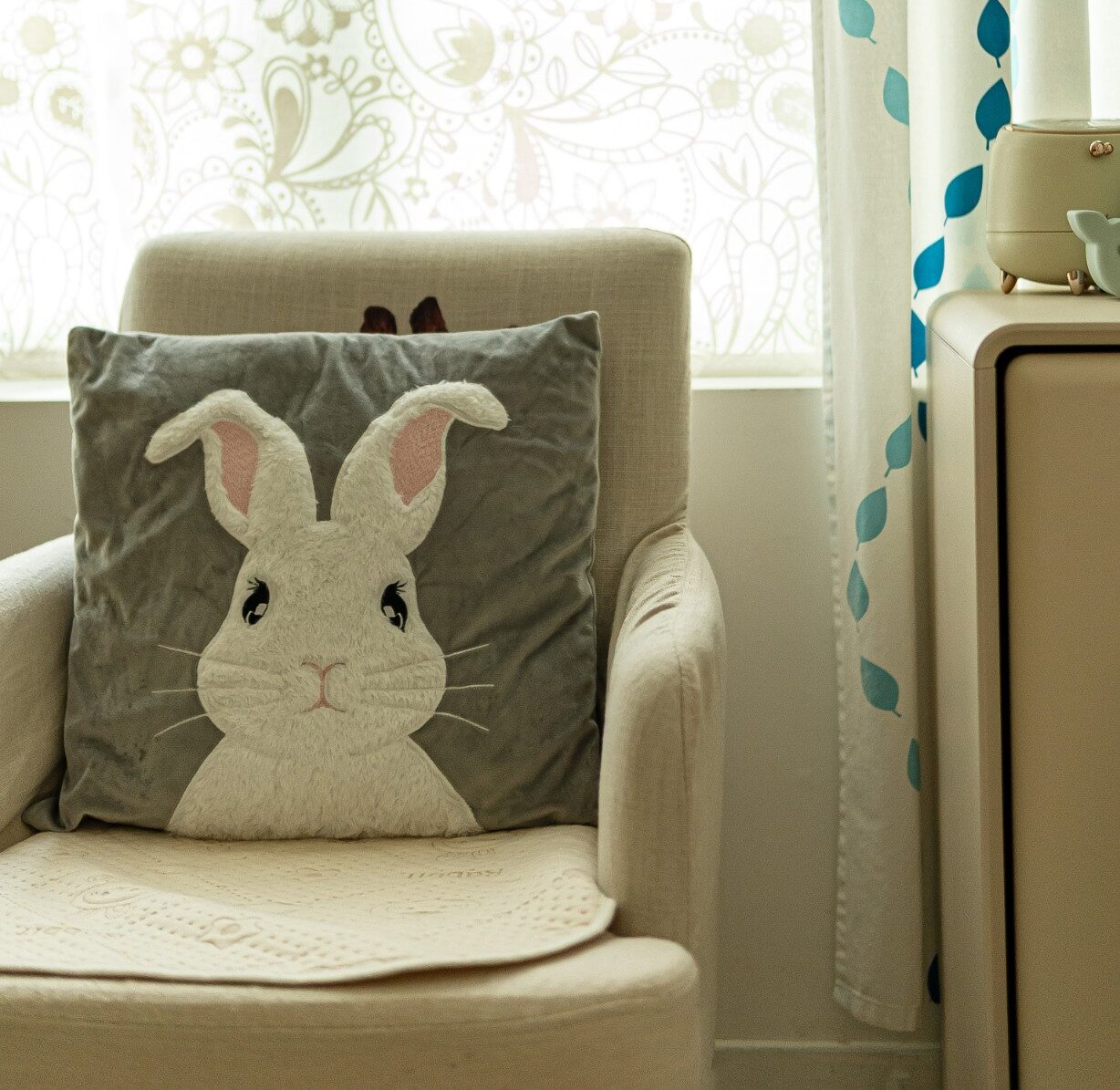 a pillow with a cute rabbit pattern on it. In a comfortable room with natural lights in Sprout in Motion Central centre.
