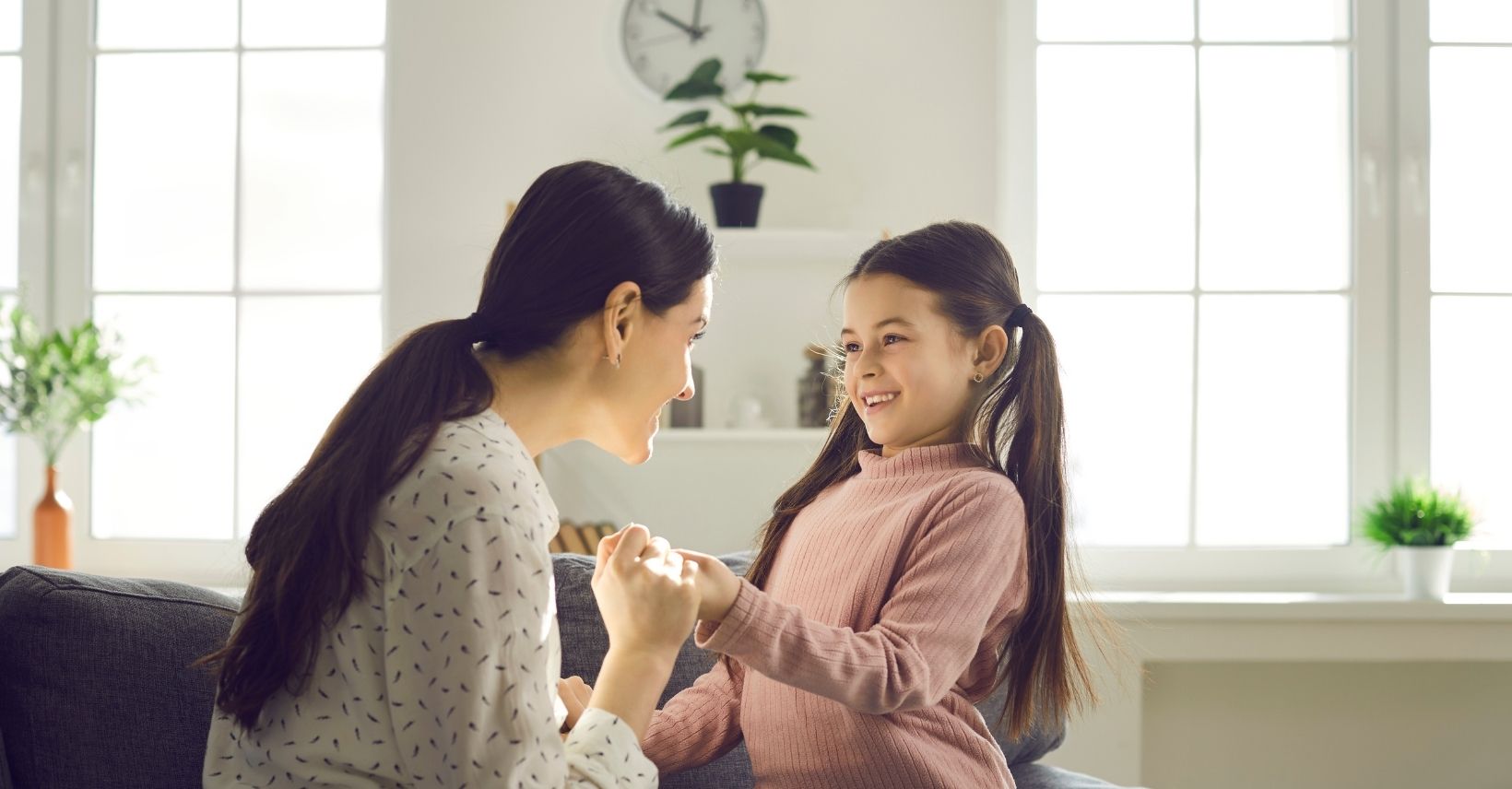 A mother explaining to her daughter.